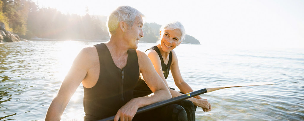 older couple outside on boat