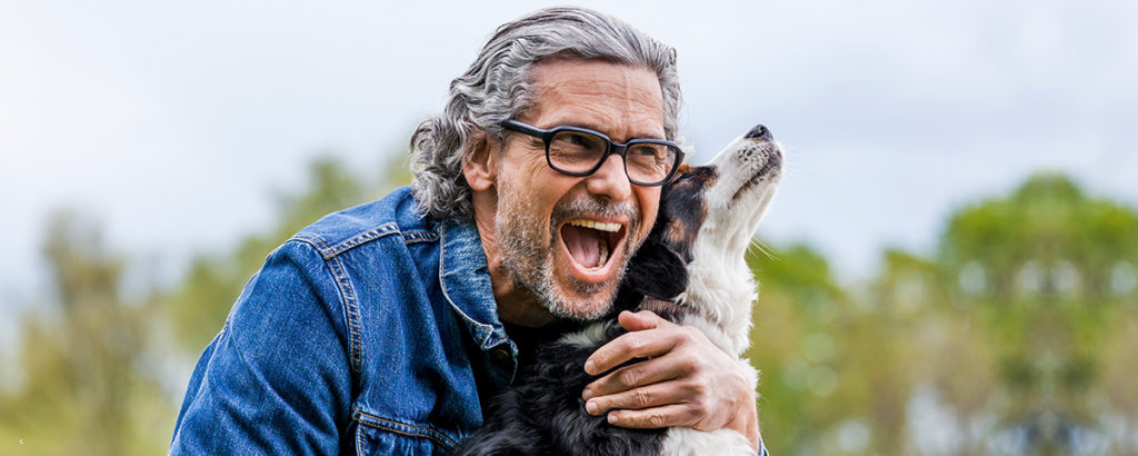 attractive older man with dog