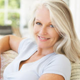 silver haired women on sofa