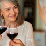 older couple drinking wine