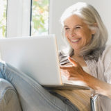 older woman on laptop