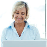 older woman using laptop