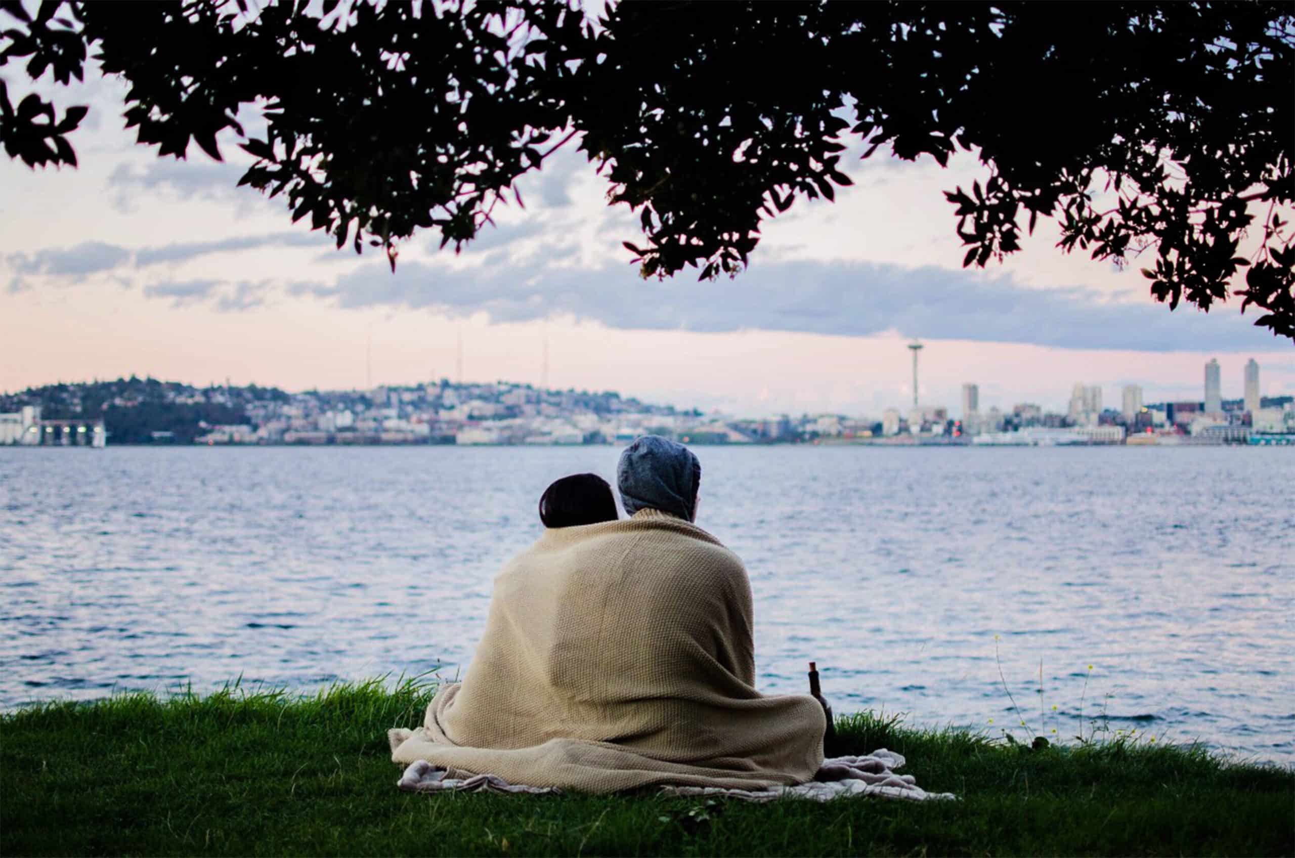 older couple looking out onto Seattle skyline