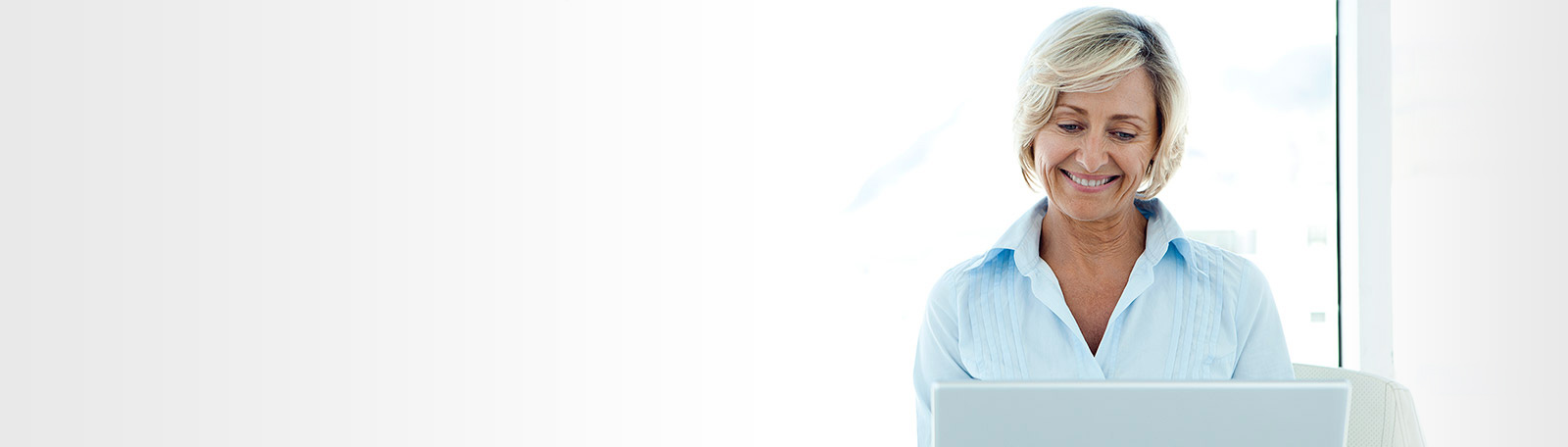 older woman using laptop