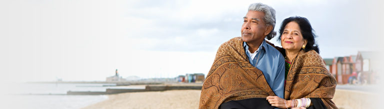 indian couple outside on beach